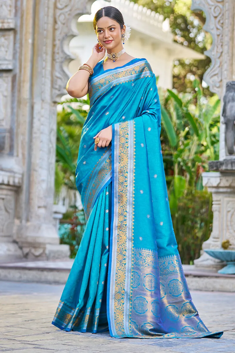 Blooming Firozi Kanjivaram Silk Saree With Traditional Blouse Piece