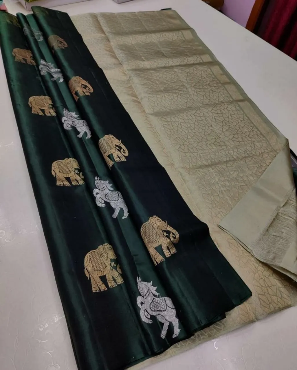 Cynosure Green Soft Silk Saree With Alluring Blouse Piece