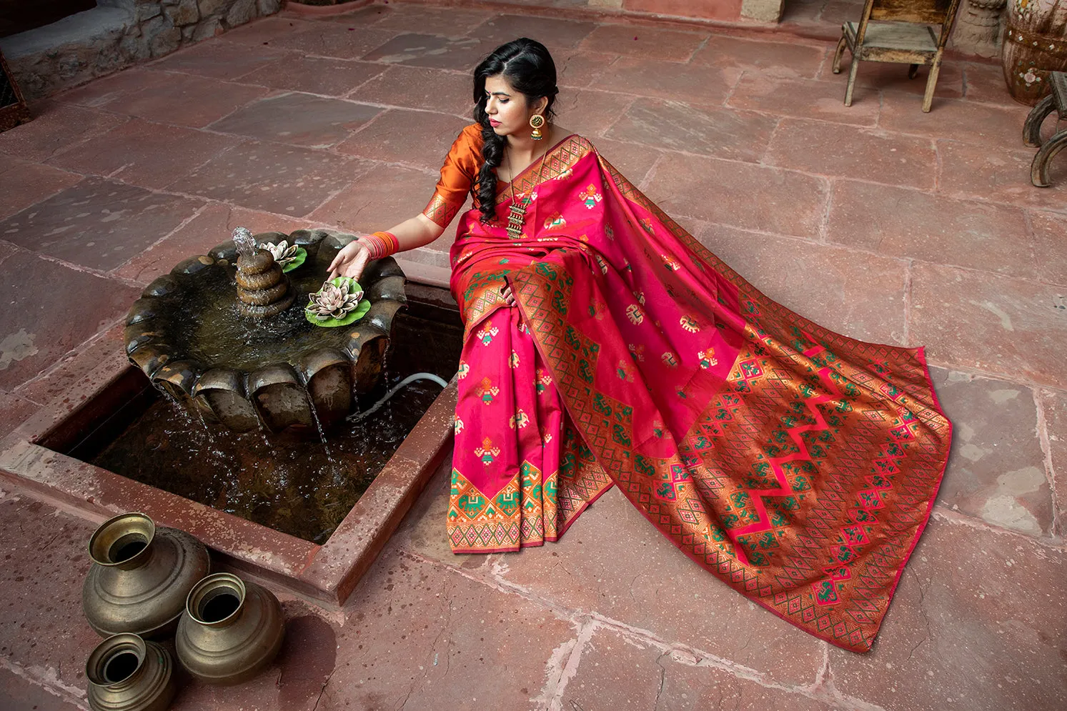 Glamourous Dark Pink Woven Silk Patola Fancy Saree