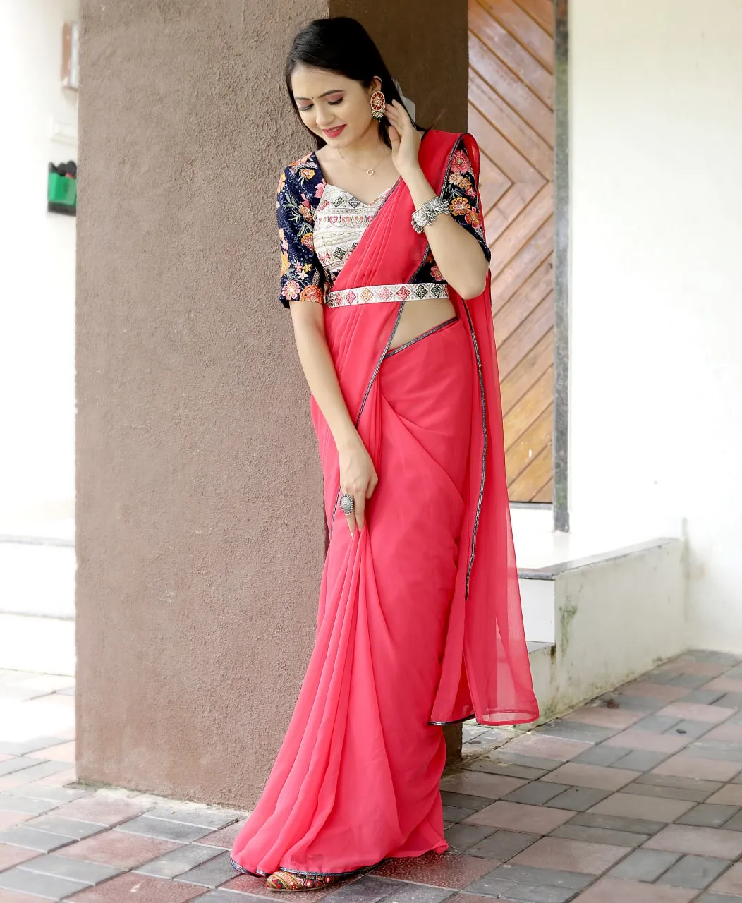 Glamourous Peach Color Saree With Stitched Blouse